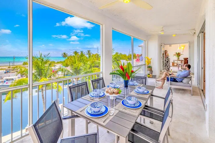 Ocean View Duplex Penthouse | Retreat amenities: tennis court, heated Pool | Vista Key One image 2